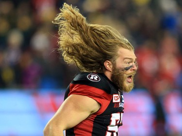 TORONTO, ON - NOVEMBER 27:  Tanner Doll #52 of the Ottawa Redblacks celebrates victory following the final whistle during the 104th Grey Cup Championship Game against the Calgary Stampeders at BMO Field on November 27, 2016 in Toronto, Canada.