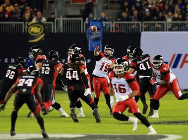 TORONTO, ON - NOVEMBER 27:  Quarterback Bo Levi Mitchell #19 of the Calgary Stampeders passes the ball during the first half of the 104th Grey Cup Championship Game against the Ottawa Redblacks at BMO Field on November 27, 2016 in Toronto, Canada.
