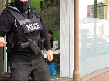Cops raiding weedical on Rideau