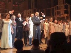 In this image made from a video provided by Hamilton LLC, actor Brandon Victor Dixon who plays Arron Burr, the nation‚Äôs third vice president, in &ampquot;Hamilton&ampquot; speaks from the stage after the curtain call in New York, Friday, Nov. 18, 2016. Vice President-elect Mike Pence is the latest celebrity to attend the Broadway hit &ampquot;Hamilton,&ampquot; but the first to get a sharp message from a cast member from the stage. (Hamilton LLC via AP)
