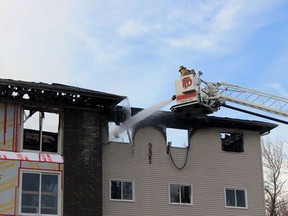 Flames gutted the top floors of a new students' residence in downtown Pembroke this morning.

The Pembroke Fire Department responded to the four-alarm blaze at around 6 a.m. The apartment complex is located on Lake Street near the intersection with Christie Street just west of the Pembroke Memorial Centre.