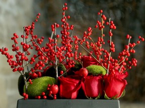 A decorative rose pot adds punch at the entryway.