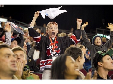 A young fan is overjoyed after an Ottawa 67's goal against the Guelph Storm.