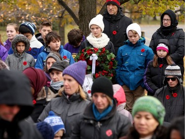 About 270 kids from Regina Public School and Dr. F.J. MacDonald Catholic School walked to Remembrance Day ceremonies at the Flanders Field Mosaic Memorial at Britannia Park Friday (Nov. 11, 2016) morning.  Parents, teachers and community members joined the kids, who read poems, sang songs and placed their poppies on wreaths after the service.