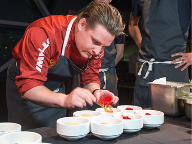 Adam Vetterol of North and Navy prepares bowls of Trout in Bubbles as ten Ottawa area chefs compete in the annual Gold Medal Plates competition and fund raiser for the Canadian Olympic Organization.   Wayne Cuddington/ Postmedia