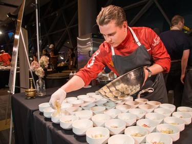 Adam Vetterol of North and Navy prepares plates Trout in Bubbles as ten Ottawa area chefs compete in the annual Gold Medal Plates competition and fund raiser for the Canadian Olympic Organization.   Wayne Cuddington/ Postmedia
