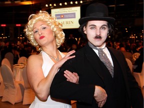 Andrée Rainville and Vincent Simms from the Ottawa Circus School added a splash of Old Hollywood glamour dressed as Marilyn Monroe and Charlie Chaplin at the Steel Toes and Stilettos Gala for Habitat for Humanity Greater Ottawa, held at the Canadian War Museum on Saturday, November 5, 2016.