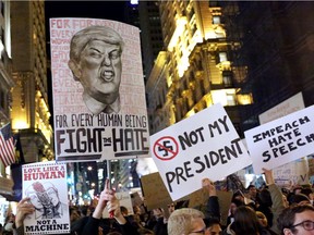 NEW YORK, NY - NOVEMBER 12: A crowd marches from Union Square to Trump Tower in protest of new Republican president-elect Donald Trump on November 12, 2016 in New York, United States. The election of Trump as president has sparked protests in cities across the country.