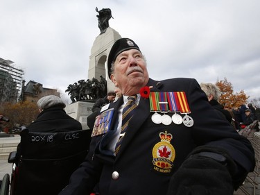 Bill McLachlan poses for a photo during the Remembrance Day ceremonies at the War Memorial in Ottawa on Friday, November 11, 2016.