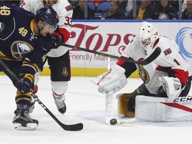 Buffalo Sabres' William Carrier (48) is stopped by Ottawa Senators goalie Mike Condon (1) during the first period of an NHL hockey game, Wednesday, Nov. 9, 2016, in Buffalo, N.Y.