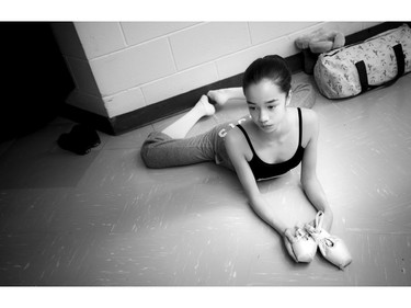 12 year old Akira Thornton warms up in the hallway before she went in to her audition Sunday morning.