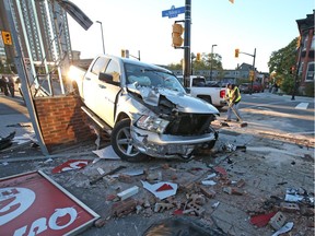 A pickup truck sits at the scene of a collision at the corner of Rideau and Augusta in Ottawa on Friday, Nov. 4, 2016.