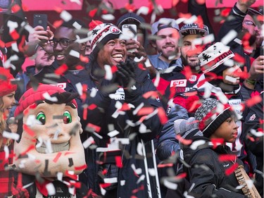 Confetti swirls around quarterback Henry Burris and the rest of the team as the Ottawa Redblacks celebrate their Grey Cup victory with a parade down Bank St and a celebration at Lansdowne Park.