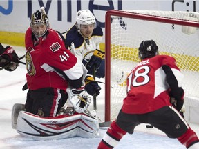 Ottawa Senators goalie Craig Anderson and Ryan Dzingel can only look on as Buffalo Sabres centre Sam Reinhart scores behind Anderson into the net during third period NHL action Saturday November 5, 2016 in Ottawa.