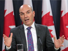 Nathan Cullen, the NDP's Critic for Democratic Reform, presents the party's submission to the Special Committee on Electoral Reform during a news conference in Ottawa, Wednesday, October 12, 2016.