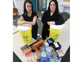 Community health nurse Sophie Lightfoot and counsellor Nikki Jalbert with harm reduction materials at Daisy's Drop-In.