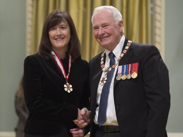 Governor General David Johnston invests Barbara Lollar, of Toronto, as a Companion of the Order of Canada during a ceremony at Rideau Hall in Ottawa, Thursday, November 17, 2016.