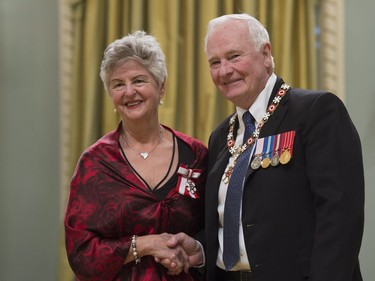 Governor General David Johnston invests Madeleine Delaney-LeBlanc, of Shellac, N.B., as a Member of the Order of Canada during a ceremony at Rideau Hall in Ottawa, Thursday, November 17, 2016.