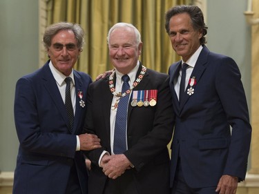 Governor General David Johnston invests Michael Budman and Don Green into the Order of Canada during a ceremony at Rideau Hall in Ottawa, Thursday, November 17, 2016.