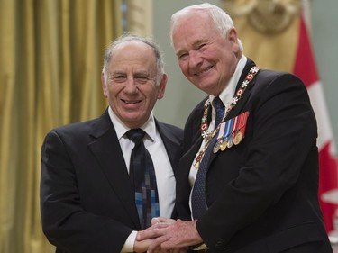 Governor General David Johnston invests Michael Eskin, of Winnipeg, M.B., as a Member of the Order of Canada during a ceremony at Rideau Hall in Ottawa, Thursday, November 17, 2016.