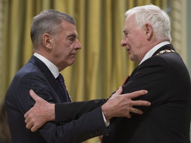 Governor General David Johnston invests Terrence Montague, of Edmonton, as a Member of the Order of Canada during a ceremony at Rideau Hall in Ottawa, Thursday, November 17, 2016.