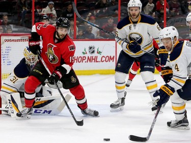 Derrick Brassard eyes the puck in front of Buffalo's net during third-period action between the Ottawa Senators and the Buffalo Sabres Tuesday (Nov. 29, 2016) at the Canadian Tire Centre in Ottawa. Despite a hat trick from Ottawa's Mike Hoffman, Buffalo still beat the Sens 5-4. Julie Oliver/Postmedia