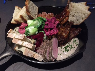 Peter Hum loved Feast + Revel's duck platter, with its roasted duck breast, smoked and cured duck "pastrami," duck confit, fried duck wings and a plenty of rich duck liver aioli.