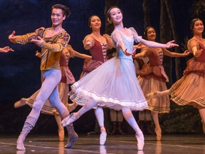 Fan Xiaofeng in the roll of Giselle (R) and Wu Husheng as Count Albrecht during the dress rehearsal performance of Giselle by the Shanghai Ballet.