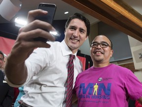 Liberal leader Justin Trudeau takes a picture with a health care worker during a campaign event Wednesday, September 30, 2015 in Surrey, B.C. THE CANADIAN PRESS/Paul Chiasson