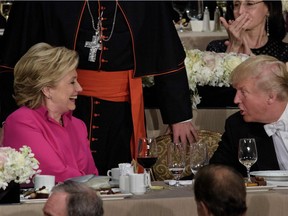 This Oct. 20 photo shows Hillary Clinton and Donald Trump together in a rare moment of levity at a charity dinner that took place while the campaign was still on.