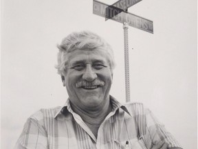 Former mayor and reeve of Gloucester Mitch Owens under the sign of the street he lives on, and was named after him in 1992. Mitch Owens died at the age of 95 in November of 2016.