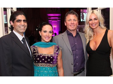From left, Vik Dilawri and his wife, Pam, were guests of Harry Mews of Myers Automotive Group, and his wife, Joanne, at the Canadian Tire Snowsuit Fund Gala held at the Fairmont Chateau Laurier on Saturday, November 12, 2016.