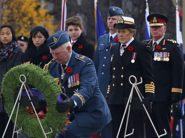 Governor General David Johnston and his wife Sharon lay a wreath during Remembrance Day ceremonies at the War Memorial in Ottawa on Friday, November 11, 2016.