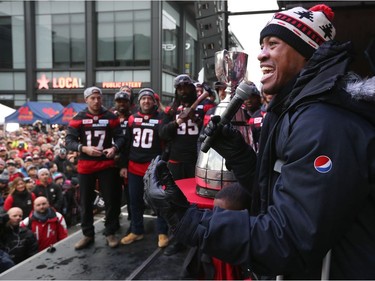 Thousands of RedBlacks fans attended a rally at Lansdowne park after  the 2016 Grey Cup Parade in Ottawa Tuesday Nov 29, 2016. RedBlacks Grey Cup MVP Henry Burris talks to the crowd during the celebration rally Tuesday.