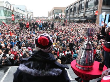 Thousands of RedBlacks fans attended a rally at Lansdowne park after  the 2016 Grey Cup Parade in Ottawa Tuesday Nov 29, 2016. RedBlacks Grey Cup MVP Henry Burris walks on stage during the celebration rally Tuesday.