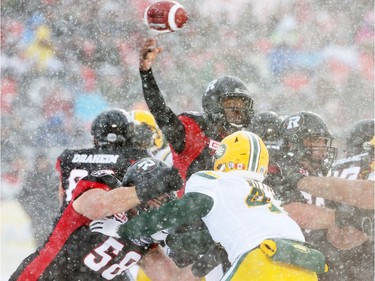 Henry Burris of the Ottawa Redblacks throws against the Edmonton Eskimos during first half of the CFL's East Division Final held at TD Place in Ottawa, November 20, 2016.  Photo by Jean Levac  ORG XMIT: 125313