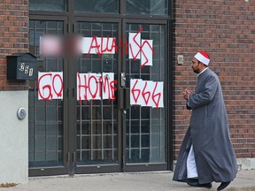 Hate graffiti on the Ottawa Mosque on Northwestern Avenue last week.