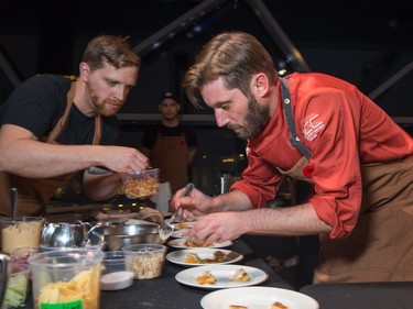 Jamie Stunt of Soif bar à vin prepares plates as ten Ottawa area chefs compete in the annual Gold Medal Plates competition and fund raiser for the Canadian Olympic Organization.   Wayne Cuddington/ Postmedia