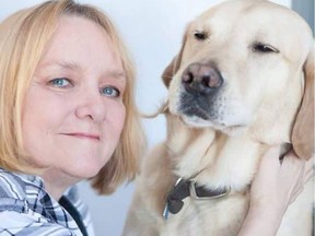 Joy Tomkinson with her assistance dog, Joel. Tomkinson died on Tuesday.