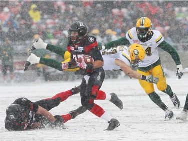 Keenan Lafrance of the Ottawa Redblacks misses the tackle by JC Sherritt of the Edmonton Eskimos during first half of the CFL's East Division Final held at TD Place in Ottawa, November 20, 2016.  Photo by Jean Levac  ORG XMIT: 125313