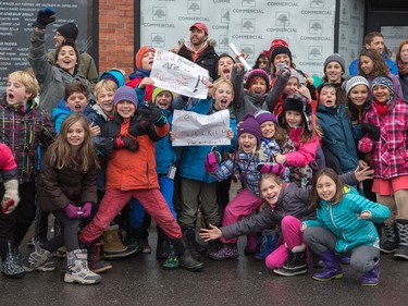 Kids from Mutchmor Public School enjoy the lunch hour trip to the parade as the Ottawa Redblacks celebrate their Grey Cup victory with a parade down Bank St and a celebration at Lansdowne Park.