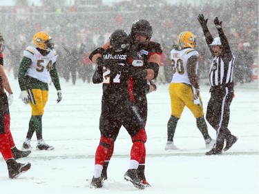 Kienan Lafrance (27) of the Ottawa Redblacks celebrates with his team his two point conversion against the Edmonton Eskimos during first half of the CFL's East Division Final held at TD Place in Ottawa, November 20, 2016.  Photo by Jean Levac  ORG XMIT: 125313