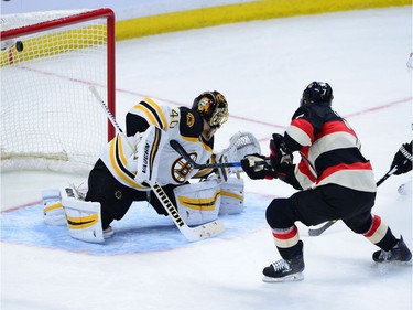 Ottawa Senators' Kyle Turris blasts a shot past Boston Bruins' Tuuka Rask during third period NHL hockey action in Ottawa on Thursday, Nov. 24, 2016.