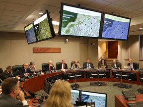 Members of the NCC board discuss approving the proposal to make Tunney's Pasture the site of the future location of the Ottawa Hospital's civic campus in Ottawa, November 24, 2016.