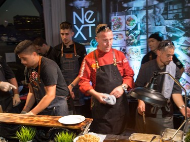 Michael Blackie of NeXT supervises his group of sous chefs as ten Ottawa area chefs compete in the annual Gold Medal Plates competition and fund raiser for the Canadian Olympic Organization.   Wayne Cuddington/ Postmedia