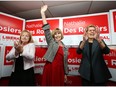 Nathalie Des Rosiers, centre, celebrates her Vanier byelection win with Madeleine Meilleur, left, and Kathleen Wynne in November 2016.