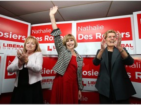 Nathalie Des Rosiers, centre, celebrates her Vanier byelection win with Madeleine Meilleur, left, and Kathleen Wynne in November 2016. A new bill proposed by Des Rosiers states Ottawa would have to have a bylaw on offering city services in English and French, but that really wouldn't change much of anything, writes David Reevely.