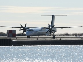 Porter Airlines plane, a Bombardier Q400 turboprop, prepares for takeoff at the Toronto City Centre airport, Friday, February 13, 2009.