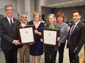 Mayor Jim Watson and Gloucester-South Nepean Ward Councillor Michael Qaqish presented the Mayor’s City Builder Award to Louise Staranczak and Frances Kane on Oct. 12. (Photo provided by City of Ottawa)