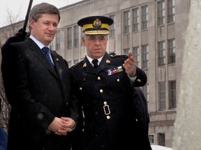 Ottawa-Giuliano Zaccardelli, Commissioner of the RCMP hosts Prime Minister designate Stephen Harper at the RCMP headquarters in Ottawa, Jan 31, 2006. Photo by KIER GILMOUR, THE OTTAWA CITIZEN, CANWEST NEWS SERVICE (For NATIONAL section - no reporter assigned) ASSIGNMENT NUMBER 75156